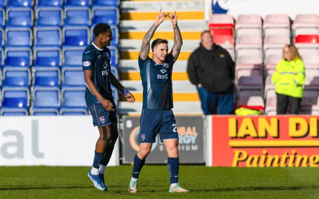 Ross County's Eamonn Brophy (R) celebrates scoring to make it 1-0 with teammate Loick Ayina during a cinch Premiership match between Ross County and Livingston at the Global Energy Stadium