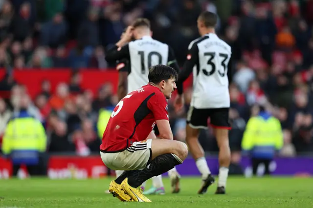 Harry Maguire of Manchester United looks dejected