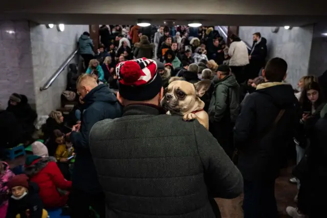 Hundreds of people, including many women and children, took shelter inside metro stations - such as here in Kharkiv -  as Russian forces first entered Ukraine