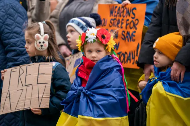 People take part in a Stand With Ukraine Against Russian Aggression rally in Edinburgh