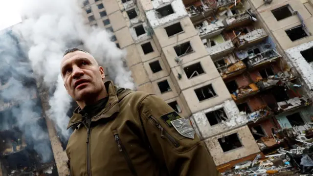 Kyiv Mayor Vitali Klitschko visits the site of a residential building heavily damaged during a Russian missile attac