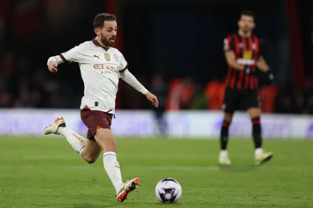 Bernardo Silva runs with the ball