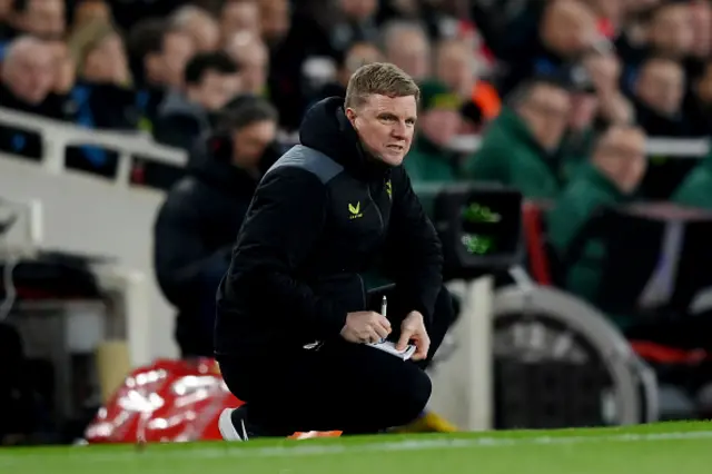 Eddie Howe, Manager of Newcastle United, takes notes