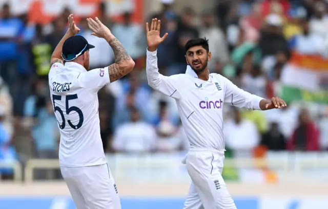 Shoaib Bashir and Ben Stokes celebrate a wicket