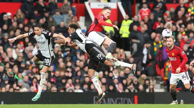 Scott McTominay of Manchester United in action with Sasa Lukic