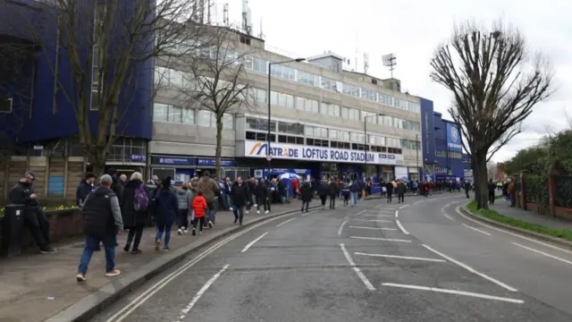 Fans arrive at Loftus Road