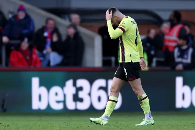 Josh Brownhill of Burnley reacts as he is sent off