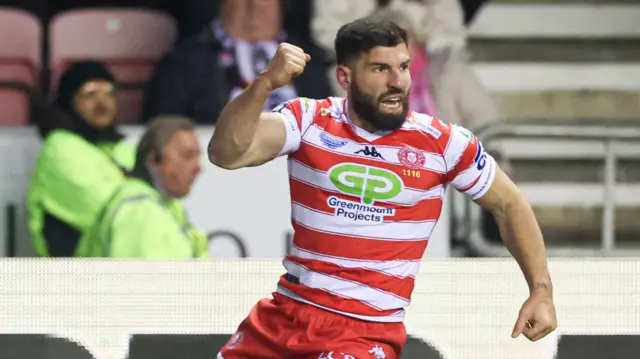 Abbas Miski celebrates his try against Penrith