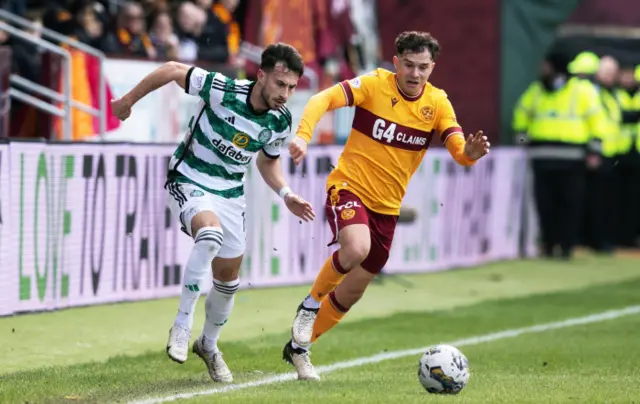 Celtic's Nicolas Kuhn and Motherwell's Davor Zdravkovski