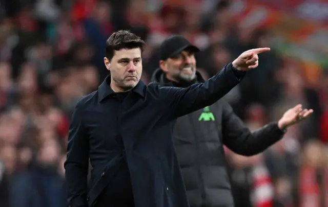 Mauricio Pochettino, Chelsea boss, with Jurgen Klopp, Liverpool manager in the background