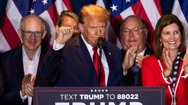 Former US President Donald Trump (C) gestures after defeating former governor Nikki Haley in South Carolina's Republican presidential primary in Columbia, South Carolina, USA, 24 February 2024. Though Trump defeated Haley handily, she is vowing to stay in the primary race. Donald Trump speaks after defeating Nikki Haley in South Carolina's Republican presidential primary, Columbia, USA - 24 Feb 2024