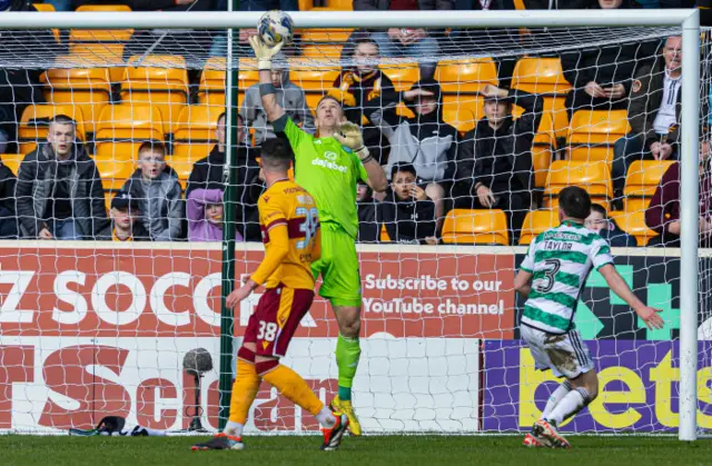 Celtic goalkeeper Joe Hart makes a save to deny Motherwell's Lennon Miller