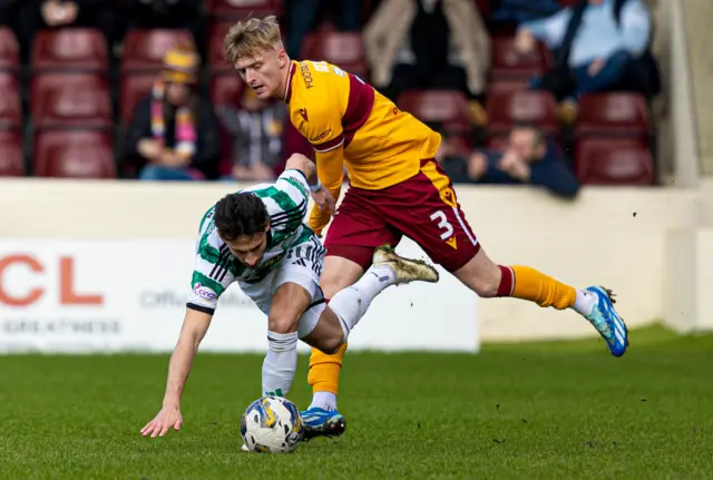 Celtic's Nicolas Kuhn and Motherwell's Georgie Gent