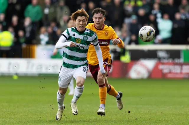 Celtic's Kyogo Furuhashi and Motherwell's Davor Zdravkovski