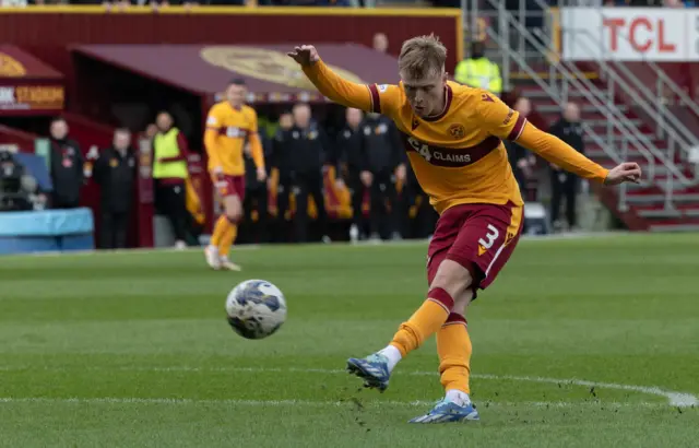 Georgie Gent has a shot for Motherwell against Celtic