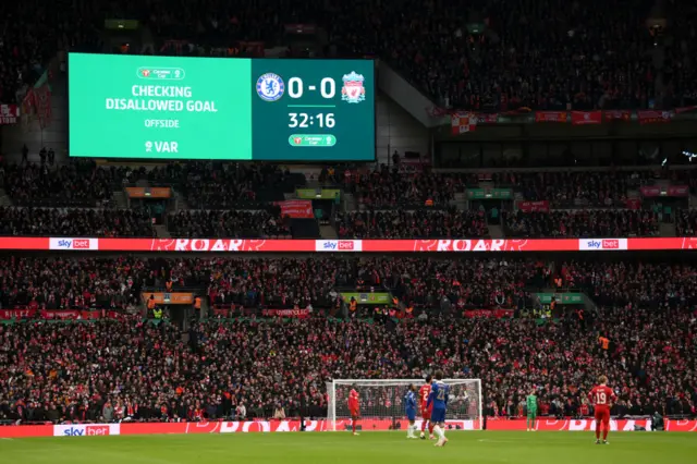 General view inside the stadium as the LED screen displays a message that a VAR check is underway for offside for the goal scored by Raheem Sterling of Chelsea