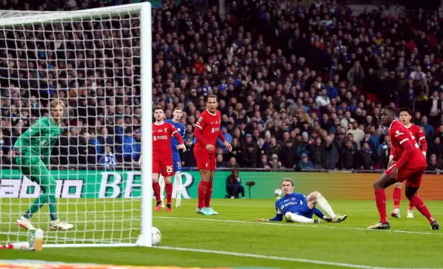 Conor Gallagher watches his shot hit the post during the English League Cup final football match between Chelsea and Liverpool