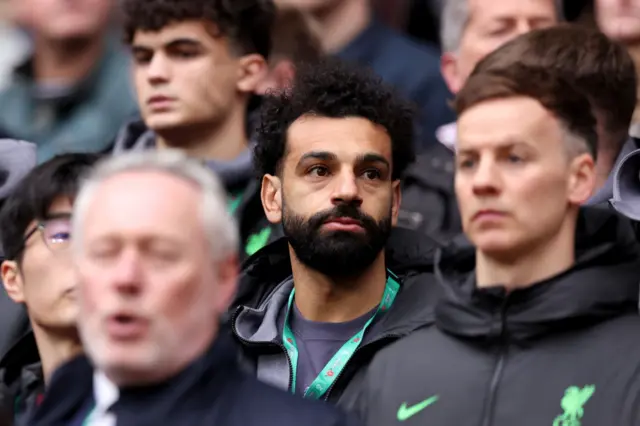 Mohamed Salah watches on during the EFL Cup final between Liverpool and Chelsea