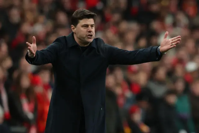 Chelsea's Argentinian head coach Mauricio Pochettino gestures on the touchline during the English League Cup final football match between Chelsea and Liverpool