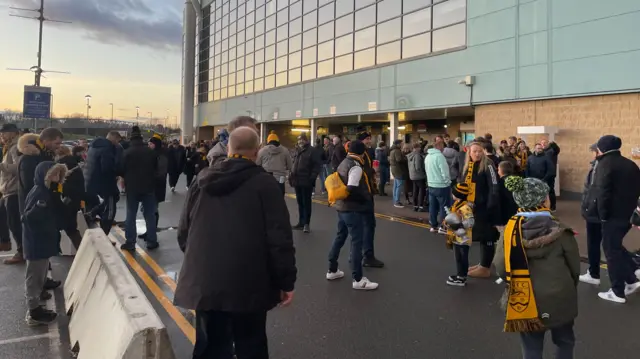 Maidstone fans arrive outside Coventry stadium