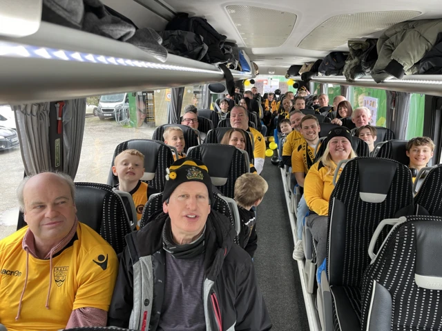 Maidstone fans on a bus heading to the game