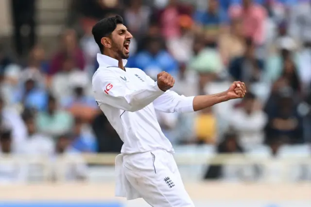 Shoaib Bashir celebrates a wicket v India