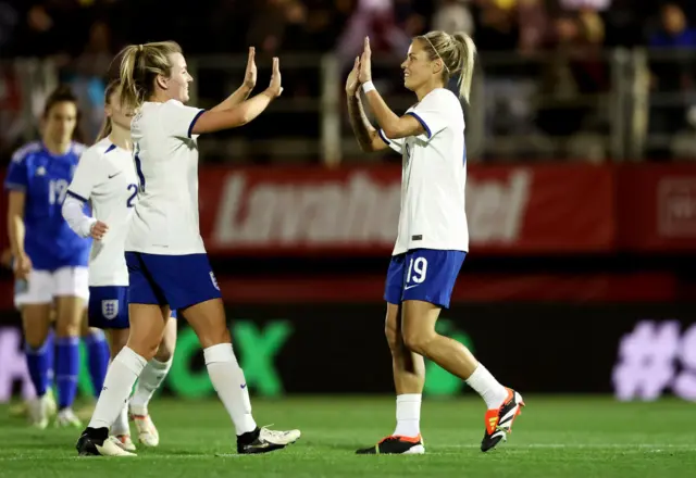 Rachel Daly and Lauren Hemp celebrate