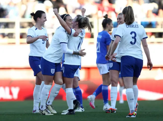 Lauren Hemp celebrates