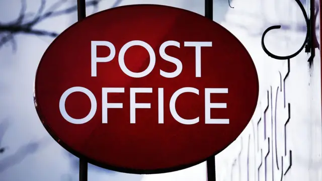 Red oval Post Office sign