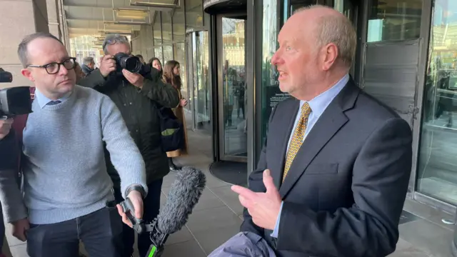 Alan Bates speaking outside of Portcullis House