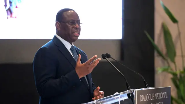 Senegal's President Macky Sall delivers a speech during the National Dialogue in Diamniadio on February 26, 2024.