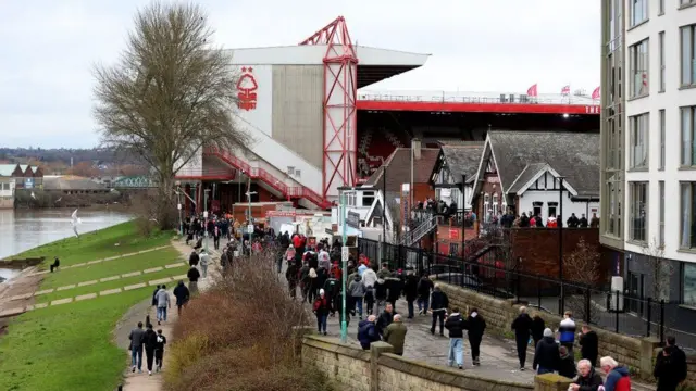 Fans walk to Nottingham Forest's City Ground