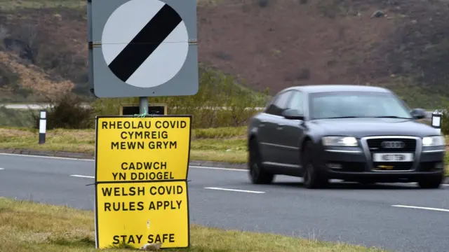 Welsh Covid rules apply sign