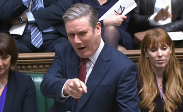 Starmer points as he questions the PM in the Commons