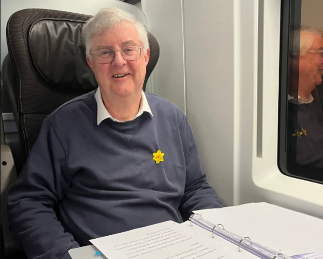 Mark Drakeford on train