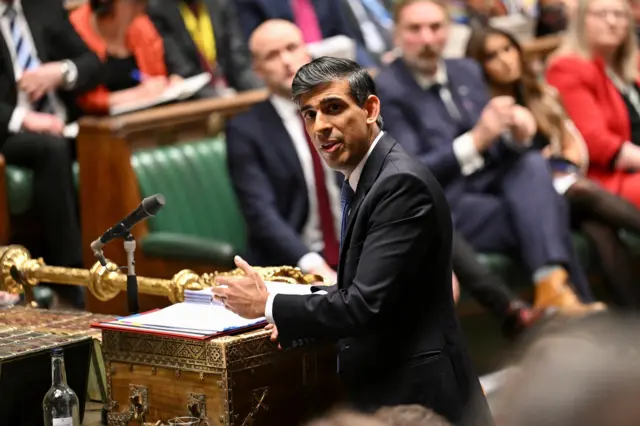 n image showing Prime Minister Rishi Sunak standing at the despatch box in the House of Commons