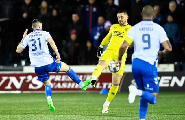 Rangers goalkeeper Jack Butland leaves his area to clear