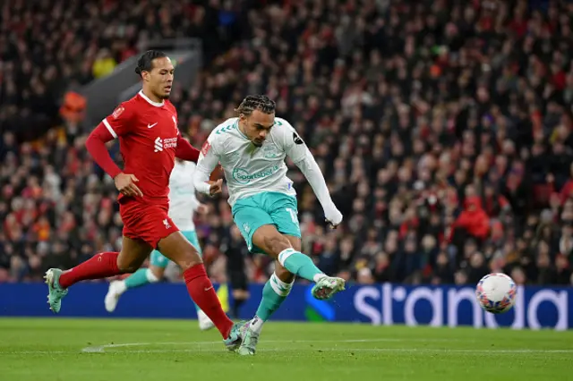 ekou Mara of Southampton scores a disallowed goal whilst under pressure from Virgil van Dijk