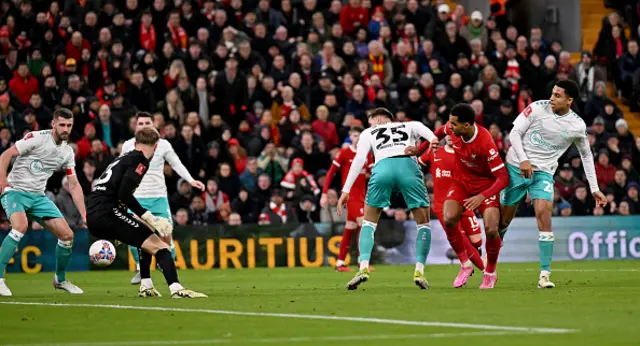 Cody Gakpo of Liverpool competing with Shea Charles of Southampton