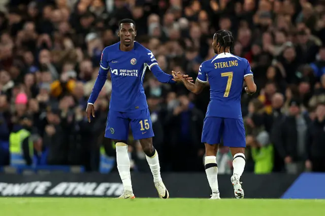 Nicolas Jackson of Chelsea celebrates scoring his team's first goal with teammate Raheem Sterling