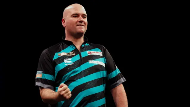 Rob Cross celebrates