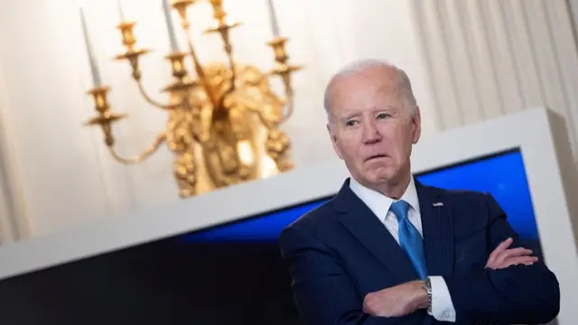 U.S. President Joe Biden looks on before speaking during a roundtable discussion on public safety at the State Dining Room at the White House in Washington, U.S., February 28, 2024.