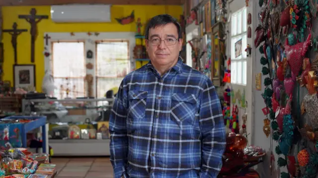 Photo is of Ivan Garza in his family's shop, Milagros.