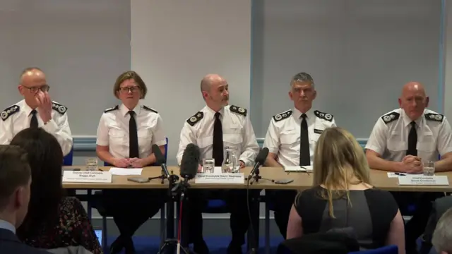 Police officers at conference