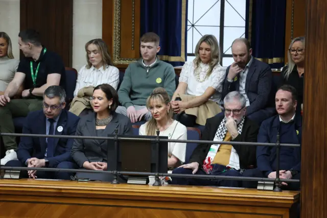 Pearse Doherty, Mary Lou McDonald, Martina Anderson, Gerry Adams and Fiachra McGuinness sitting in the public gallery during the meeting in Stormont