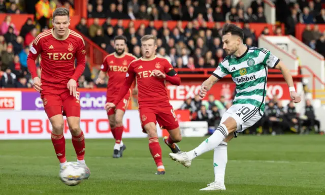 Nicolas Kuhn scores for Celtic against Aberdeen