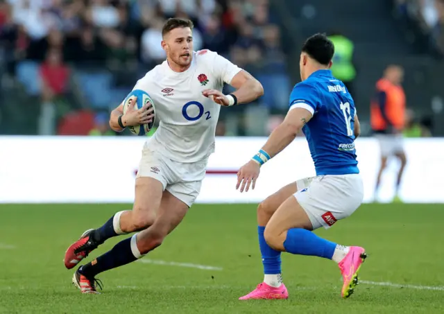 Tommy Freeman running with the ball