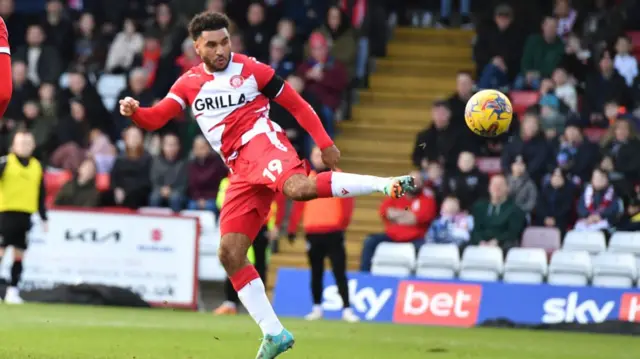 Jamie Reid in action for Stevenage