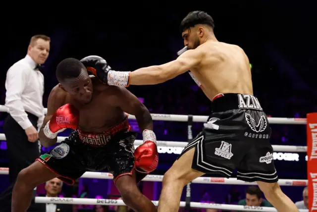 Adam Azim aims a jab