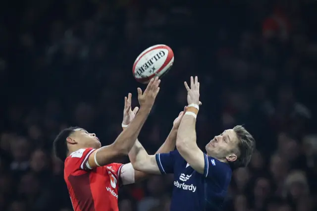 Wales and Scotland challenge for a high ball